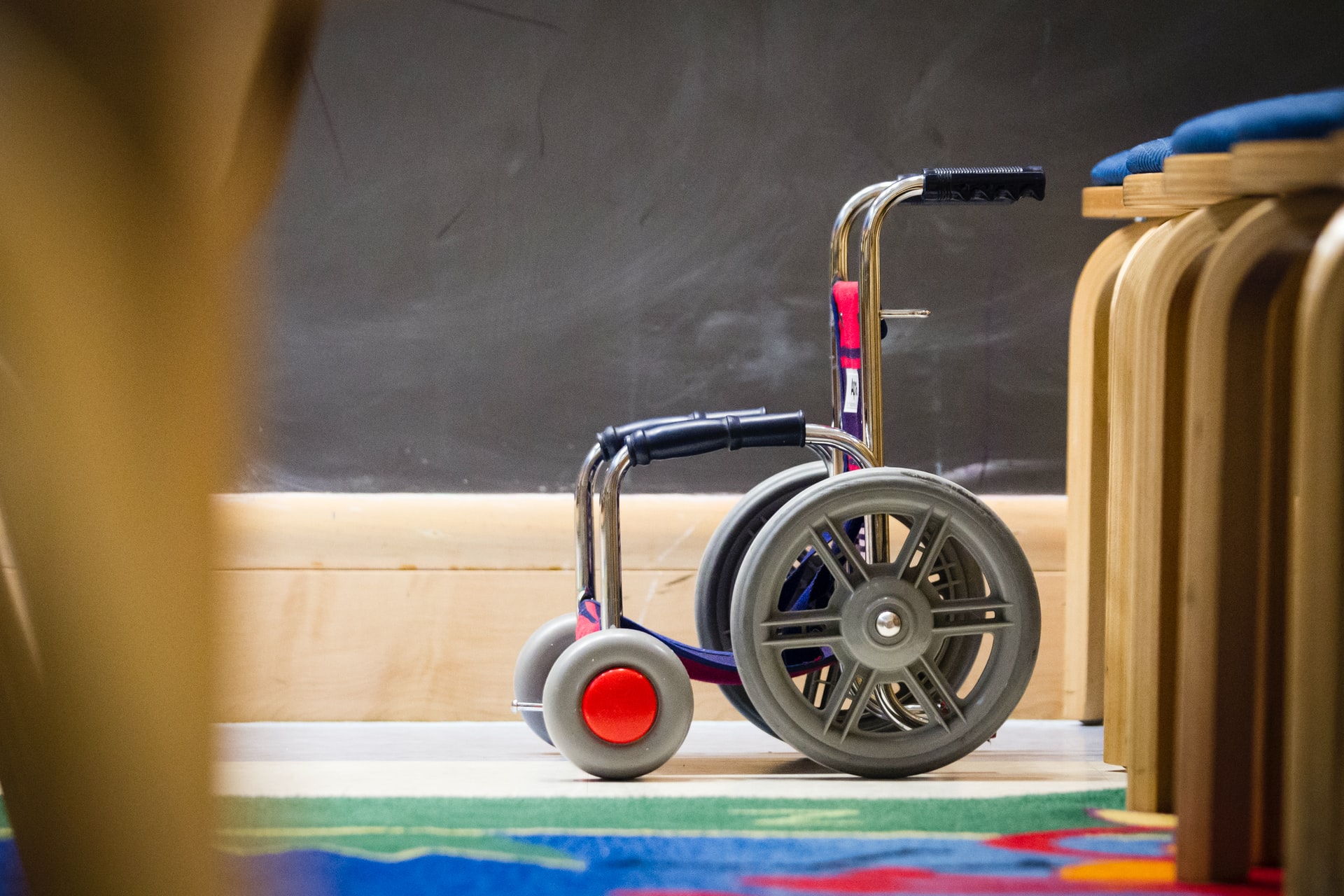 A child's wheelchair representing parents ensuring care for a disabled child after divorce